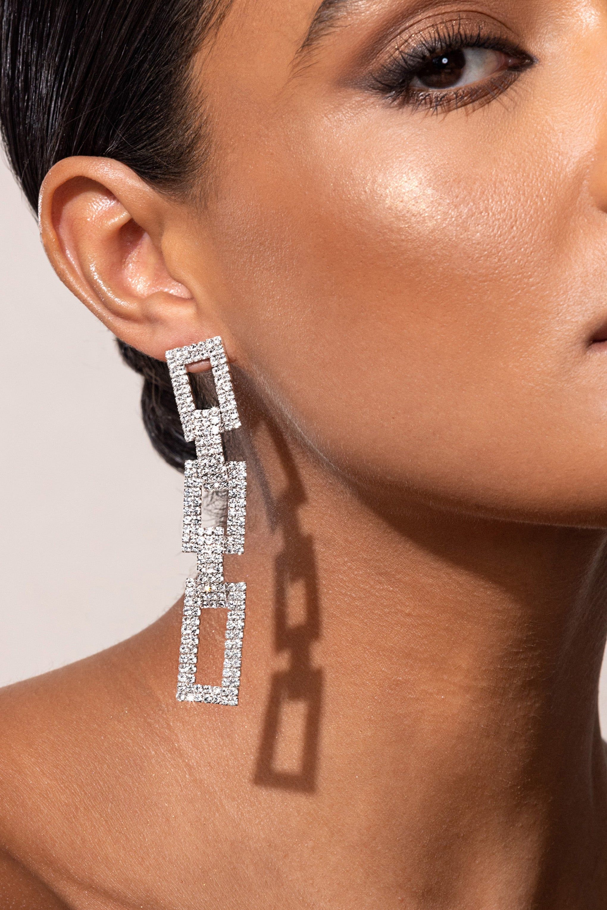 Pasqualina | Silver Diamante Chain Drop Earrings sold by Club L London product image thumbnail 2