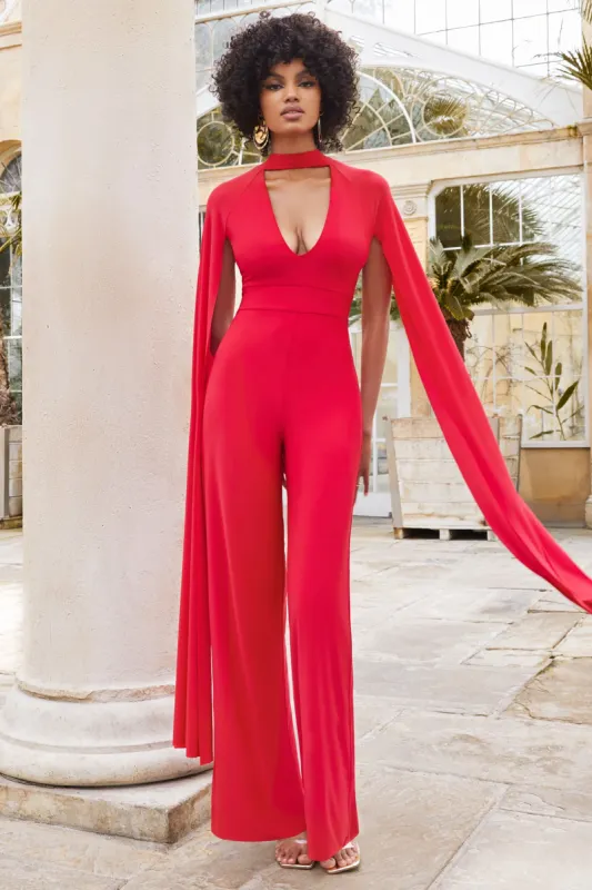 Louisa | Red Plunge Neck Jumpsuit with Floor Length Cape Sleeves sold by Club L London