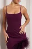 High Status | Burgundy Strappy Corset Asymmetric Maxi Dress With Feather Trim sold by Club L London