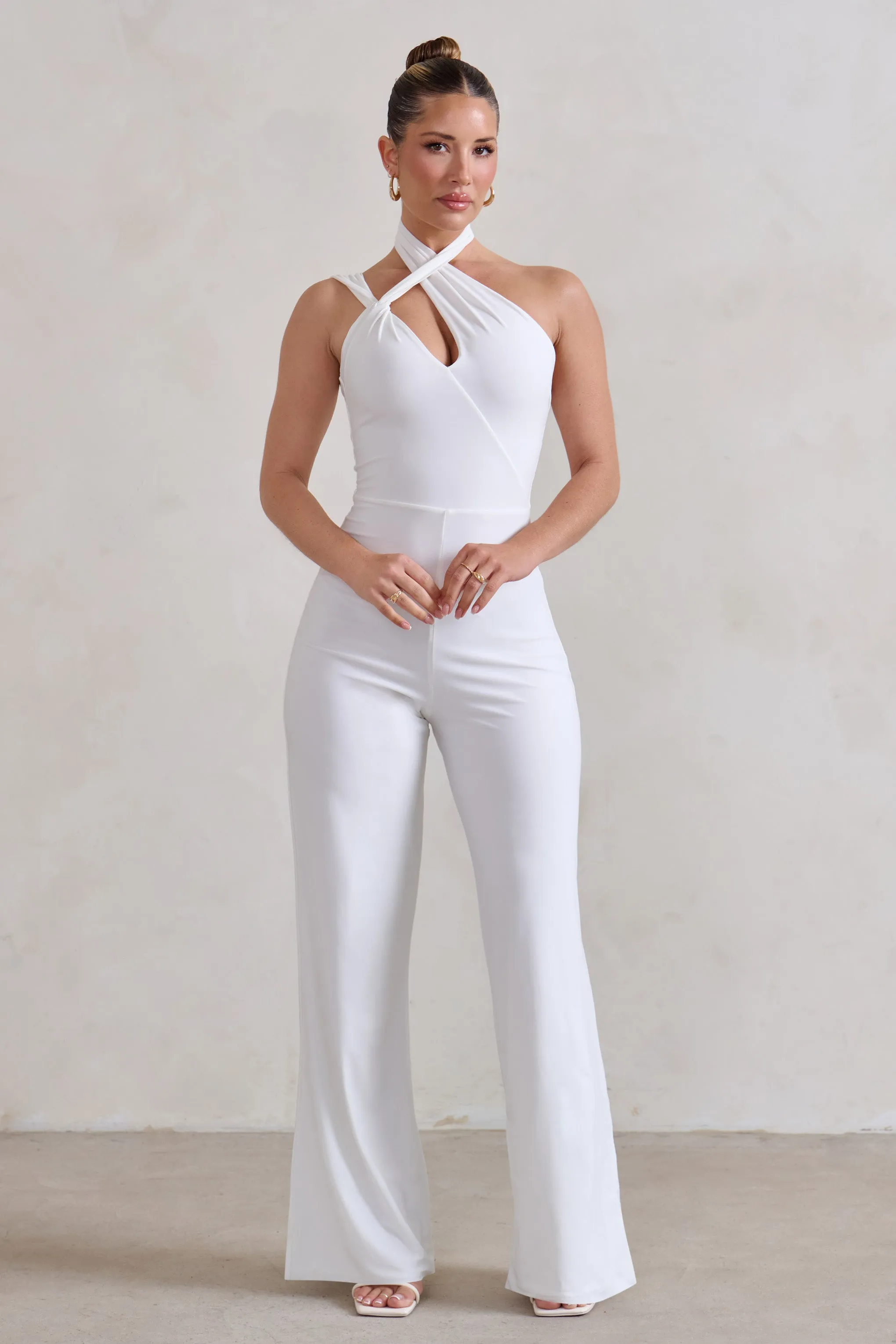 Tilly | White Cut Out Halterneck Asymmetrical Jumpsuit sold by Club L London