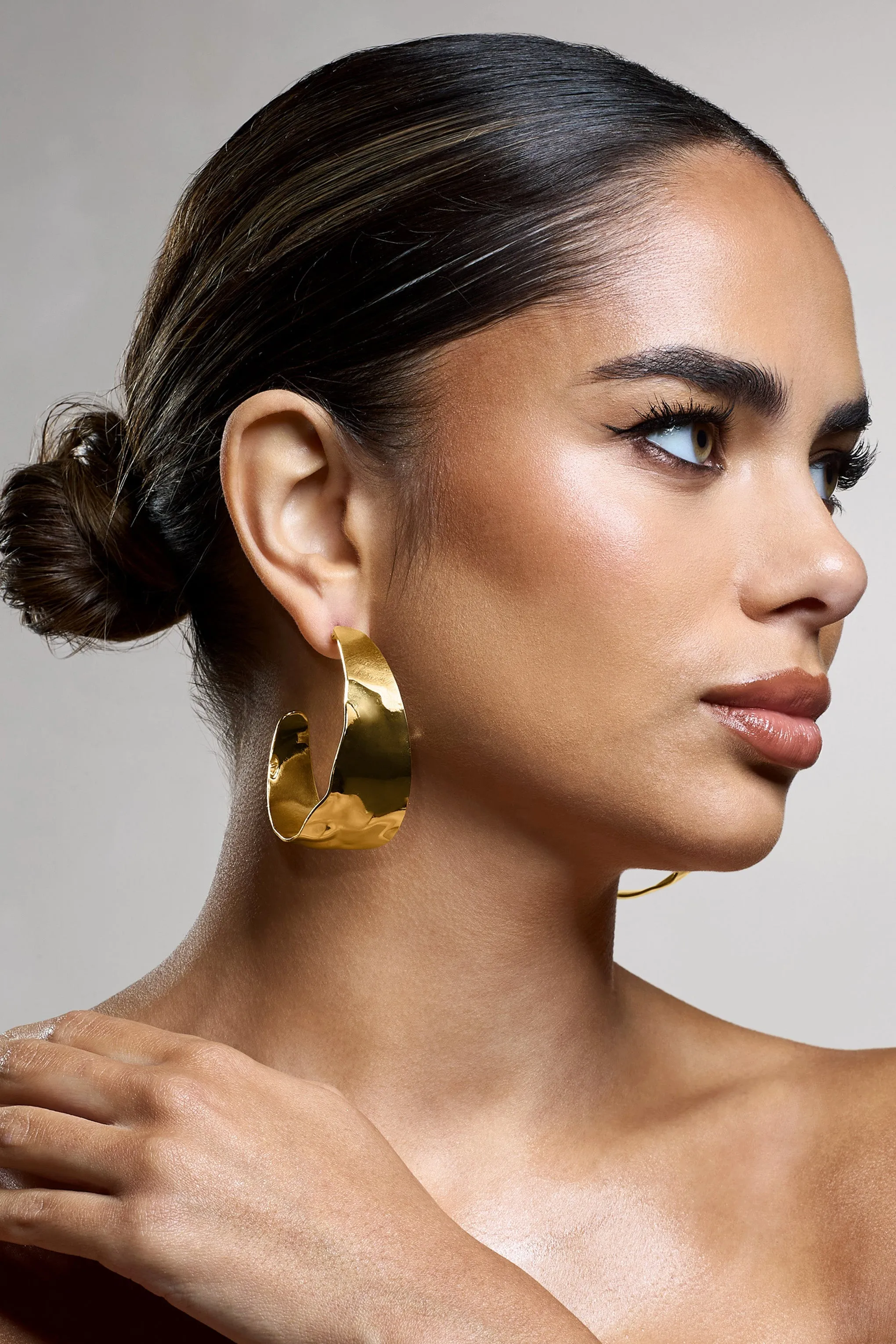 Splendor | Gold Textured Chunky Hoop Earrings sold by Club L London
