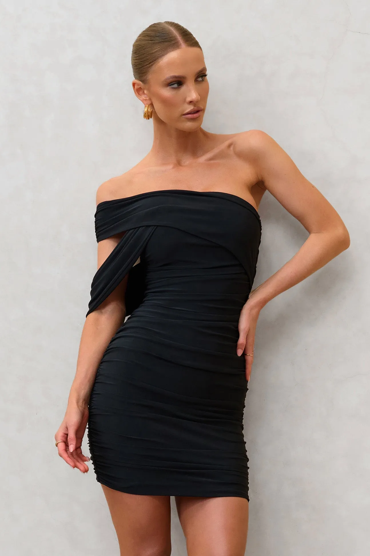 Doha | Black Asymmetric Neck Off The Shoulder Ruched Mini Dress sold by Club L London product image thumbnail 4