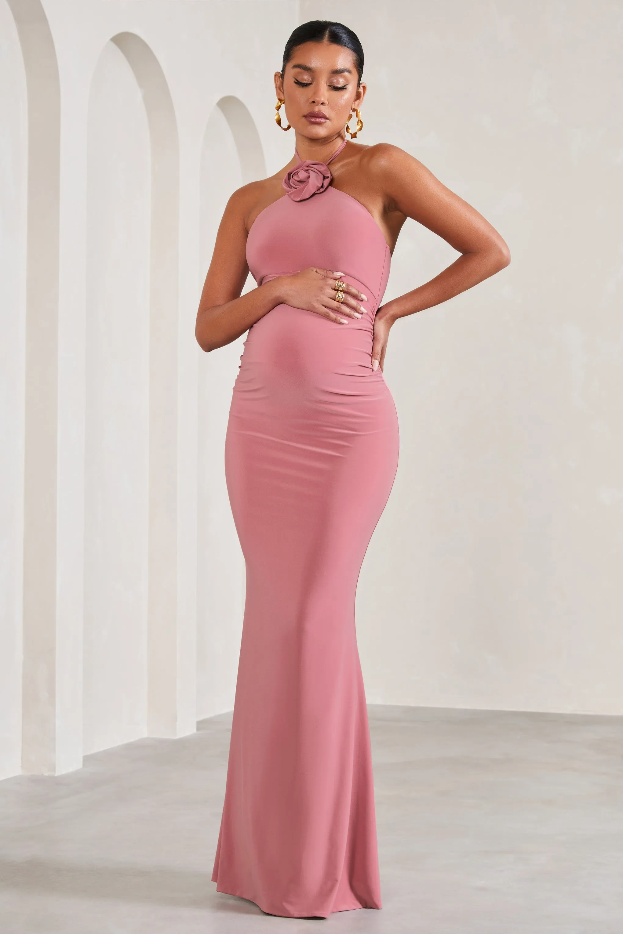 Loving | Blush Pink Halter-Neck Maternity Maxi Dress With Flower Corsage sold by Club L London
