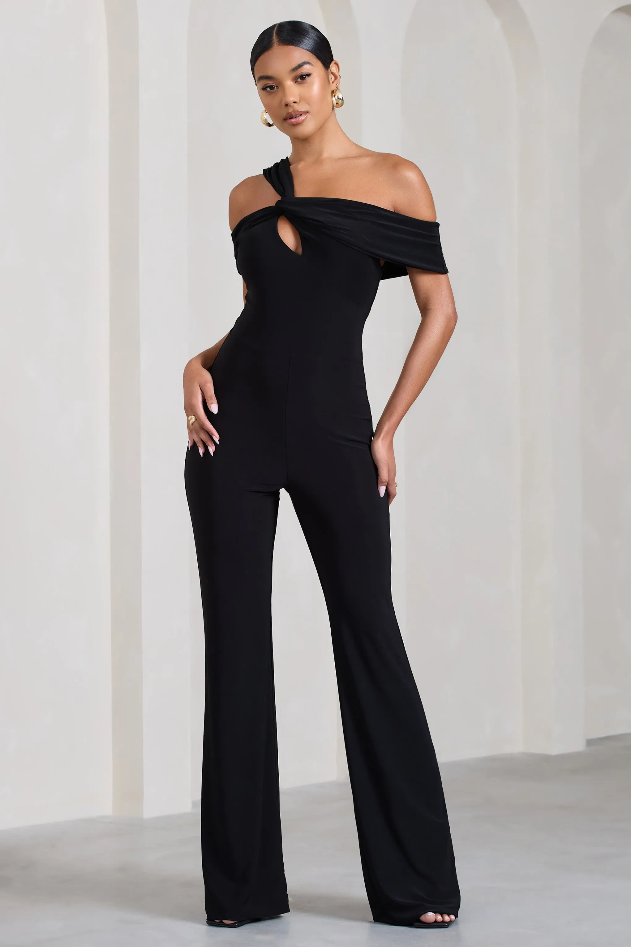 Striking | Black Strappy Asymmetric Flared-Leg Jumpsuit sold by Club L London product image thumbnail 4