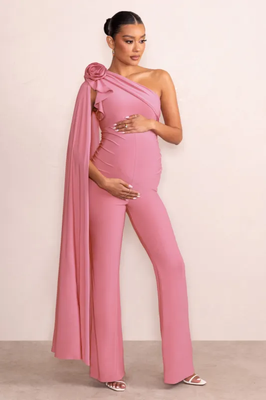Nova | Blush Pink Maternity One Shoulder Cape Jumpsuit with Flower Detail sold by Club L London