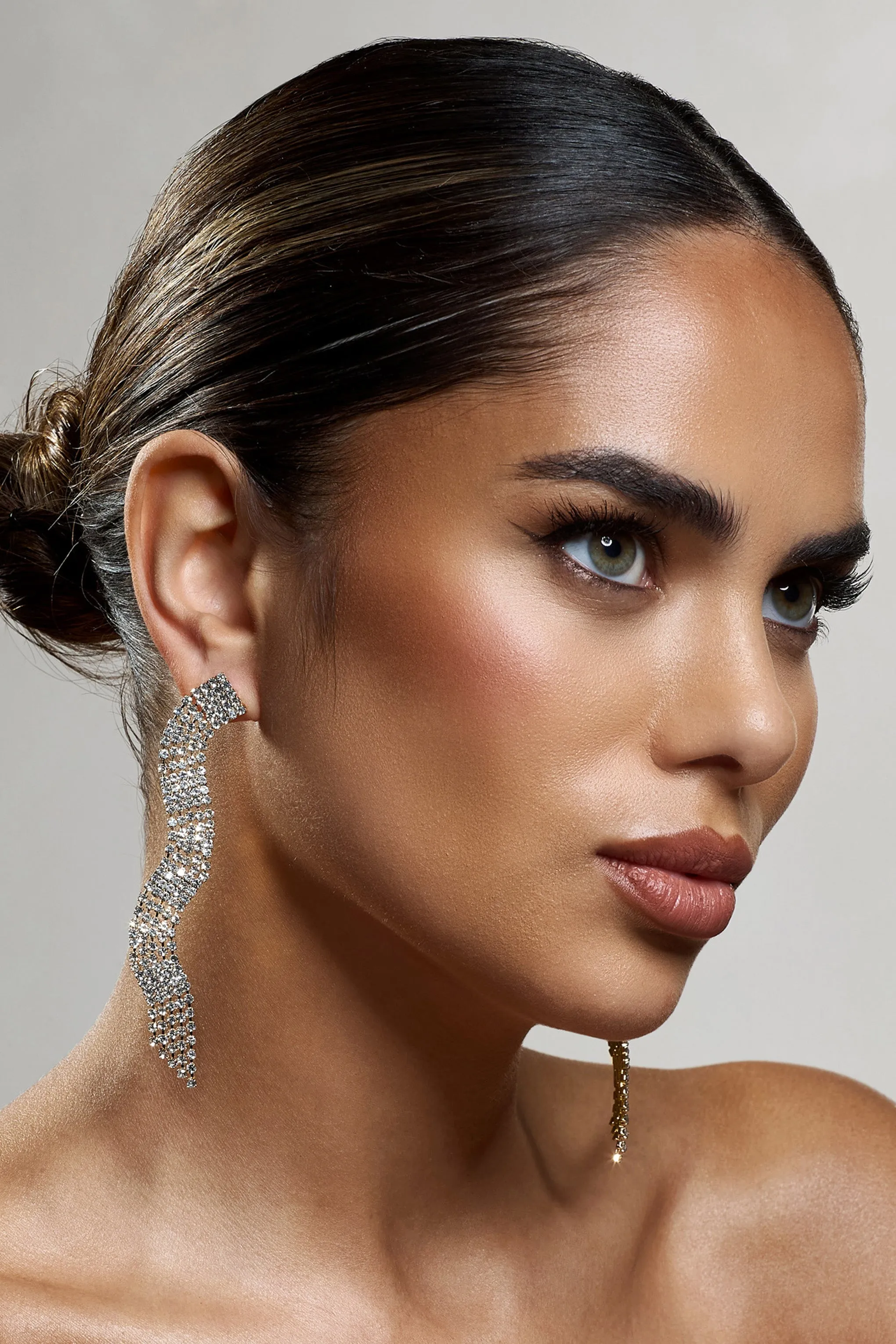 Swirl | Gold Diamante Curve Tassel Earrings sold by Club L London product image thumbnail 3