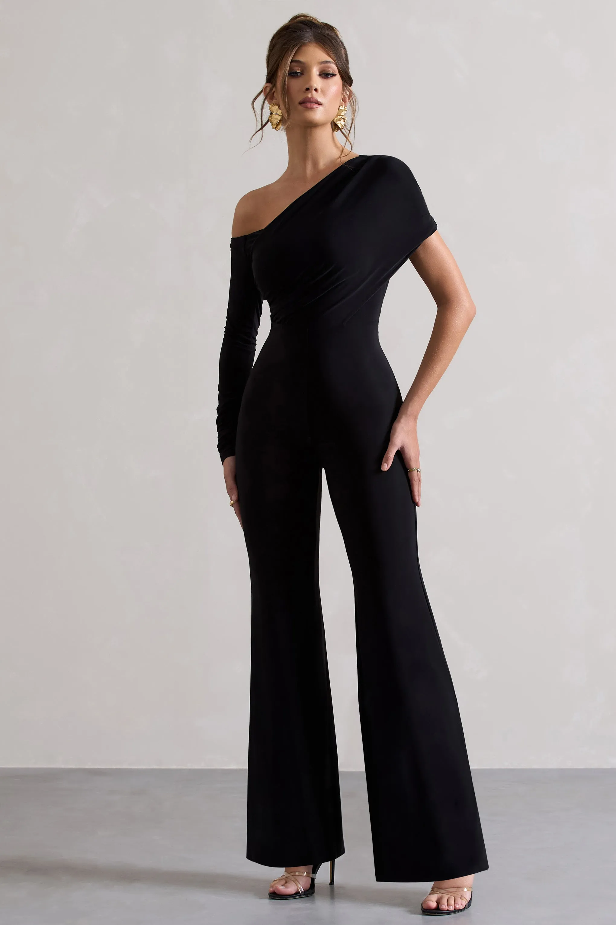 Rotate | Black Ruched Asymmetric Cut-Out Flared-Leg Jumpsuit sold by Club L London