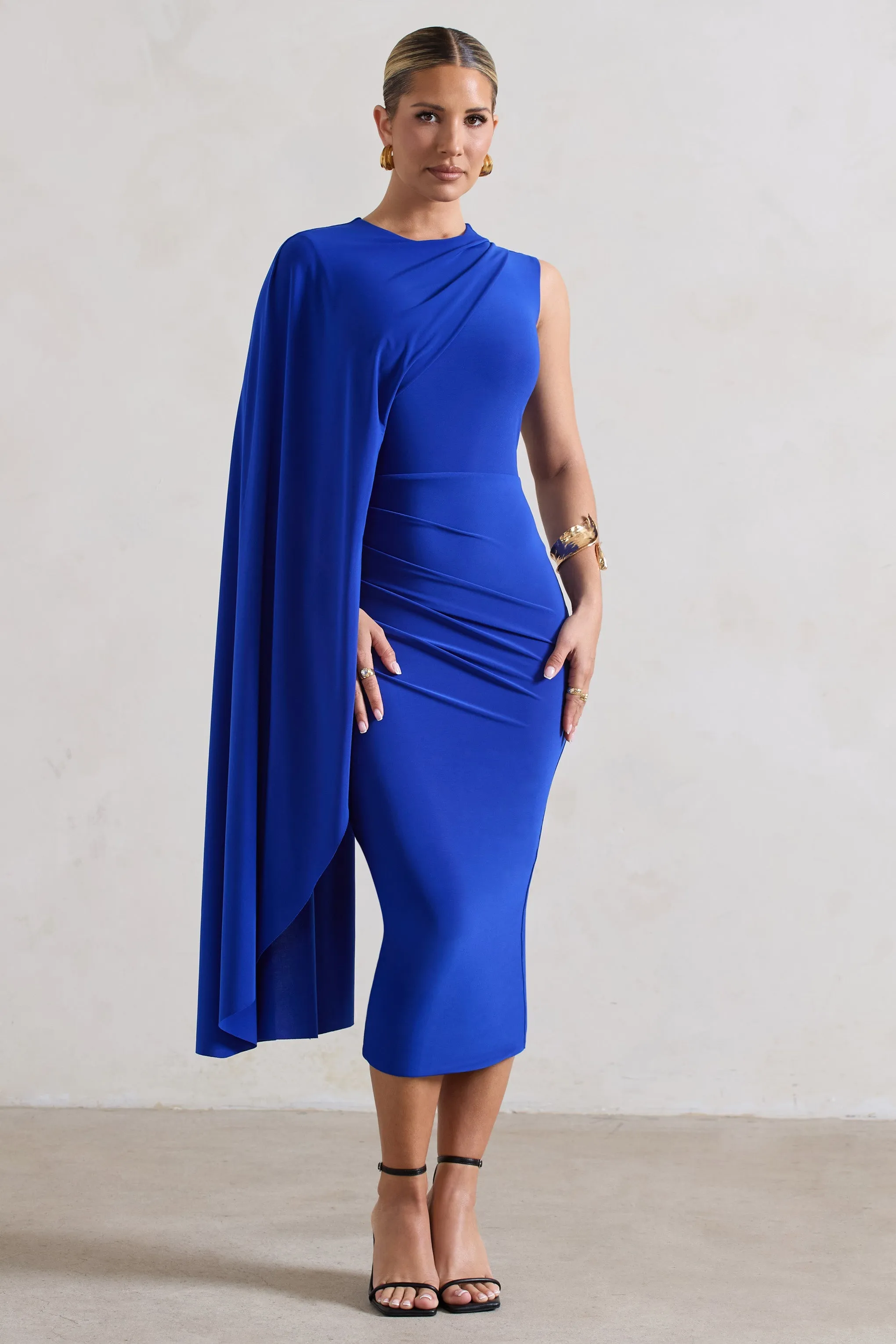 Reveal | Royal Blue One-Sleeve Cape Midi Dress sold by Club L London