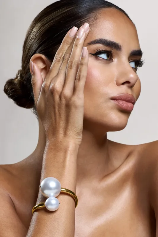 Ursula | Gold Pearl Chunky Bangle sold by Club L London