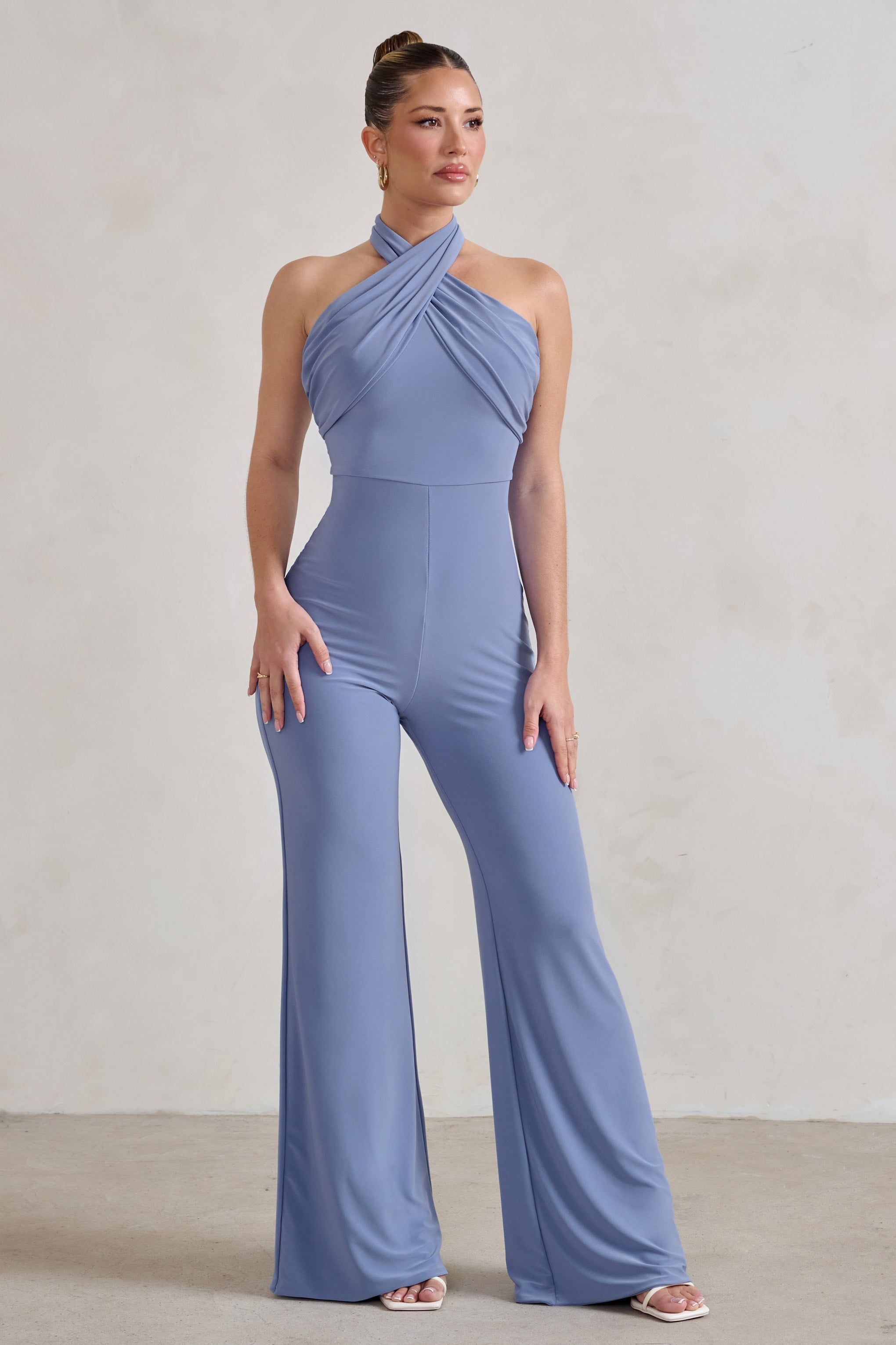 Goddess | Ice Blue Halter Neck Flare Jumpsuit sold by Club L London