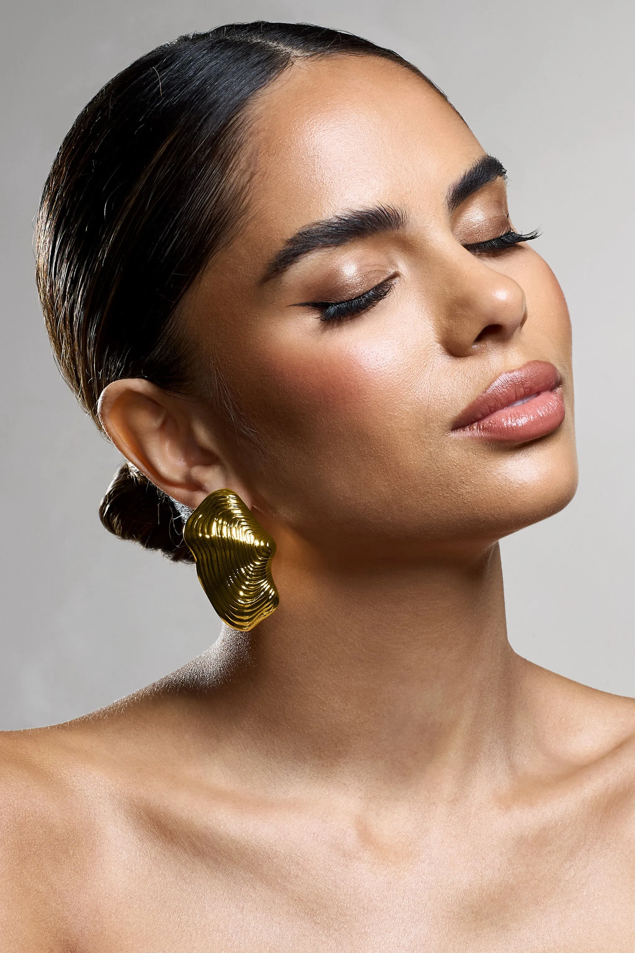 Katya | Gold Abstract Ribbed Statement Earrings sold by Club L London product image thumbnail 4
