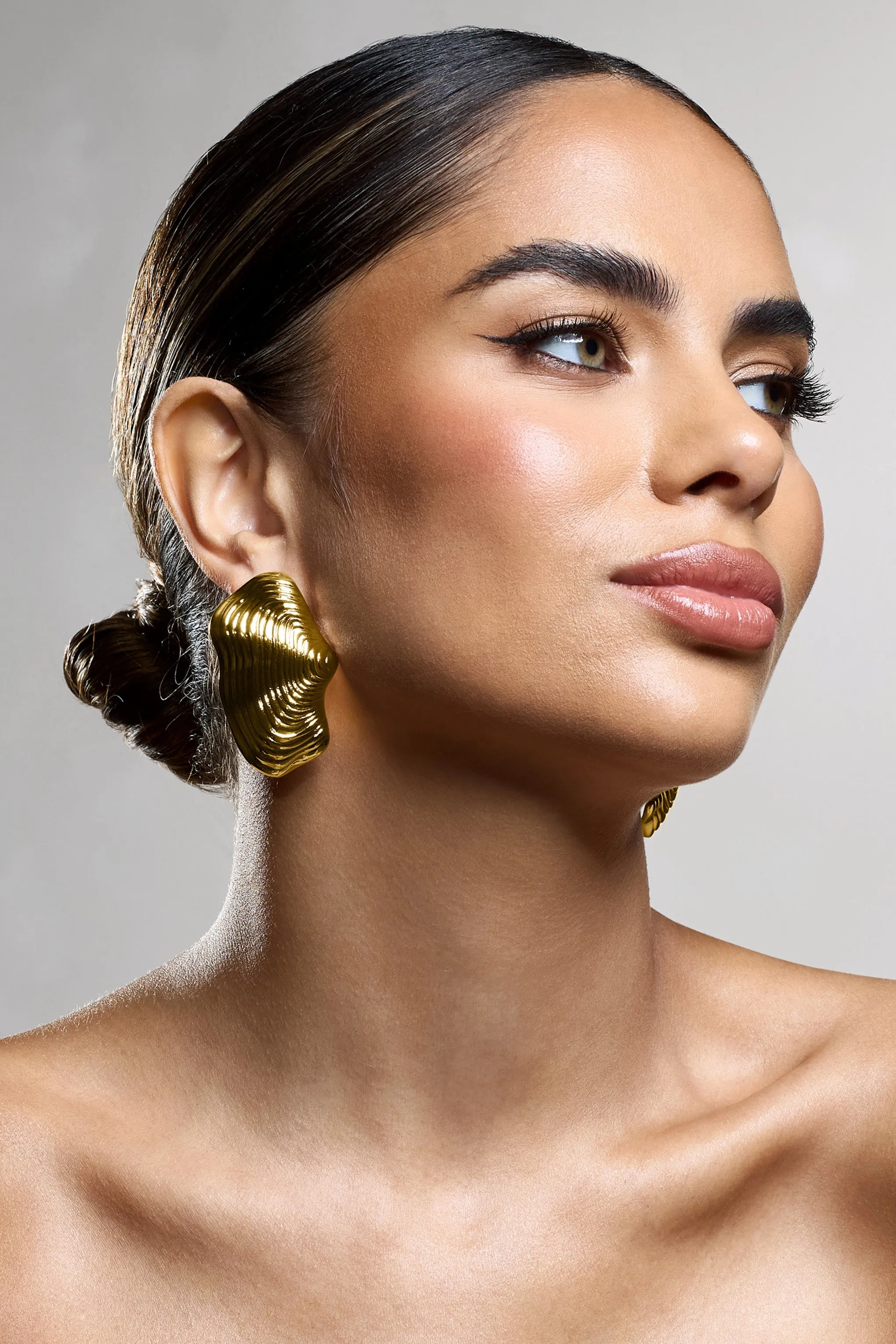 Katya | Gold Abstract Ribbed Statement Earrings sold by Club L London product image thumbnail 3