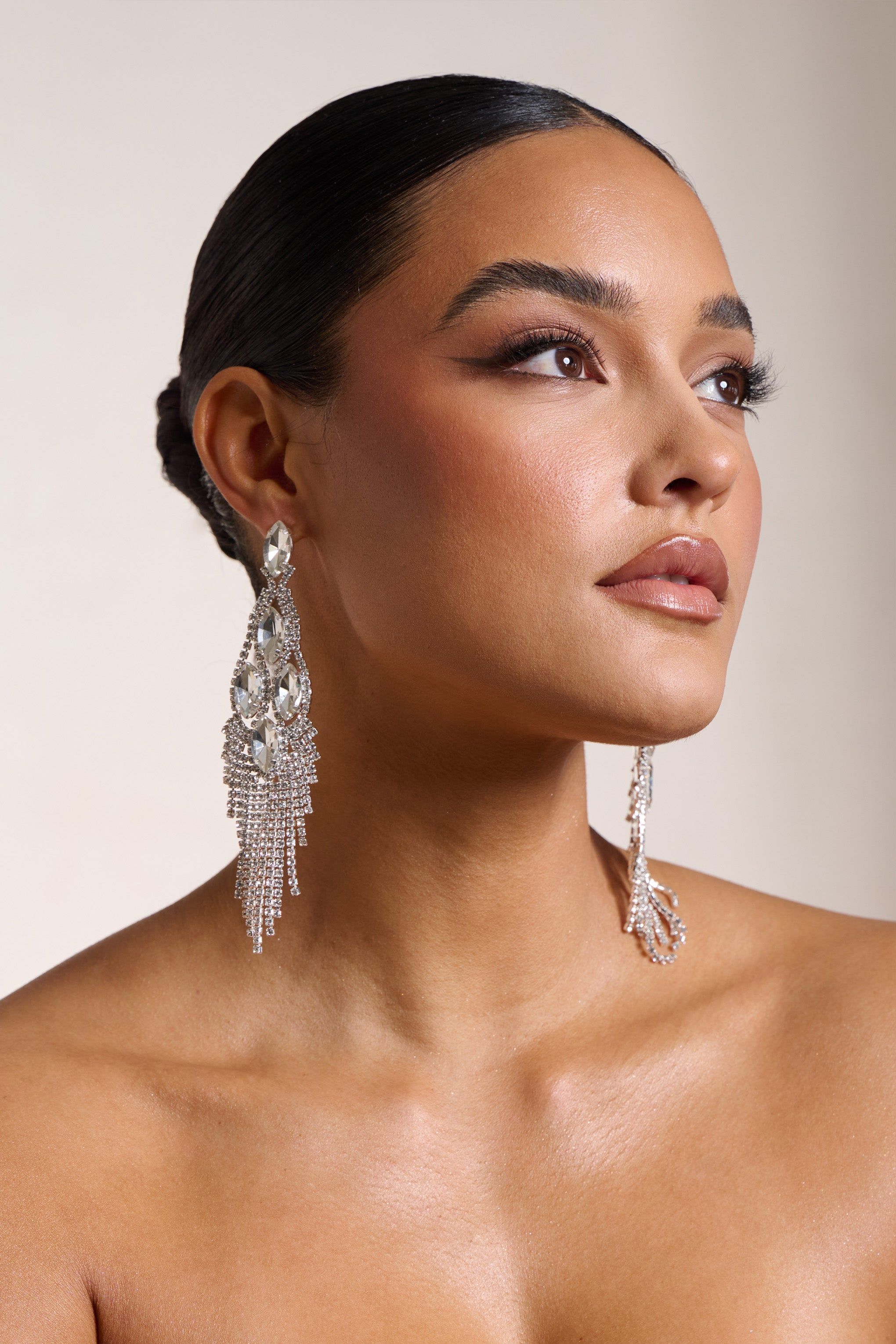 Peony | Silver Diamante Chandelier Drop Earrings sold by Club L London
