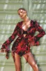 Sauvage | Red & Black Floral Print Chiffon Ruffle Long Sleeve Playsuit sold by Club L London