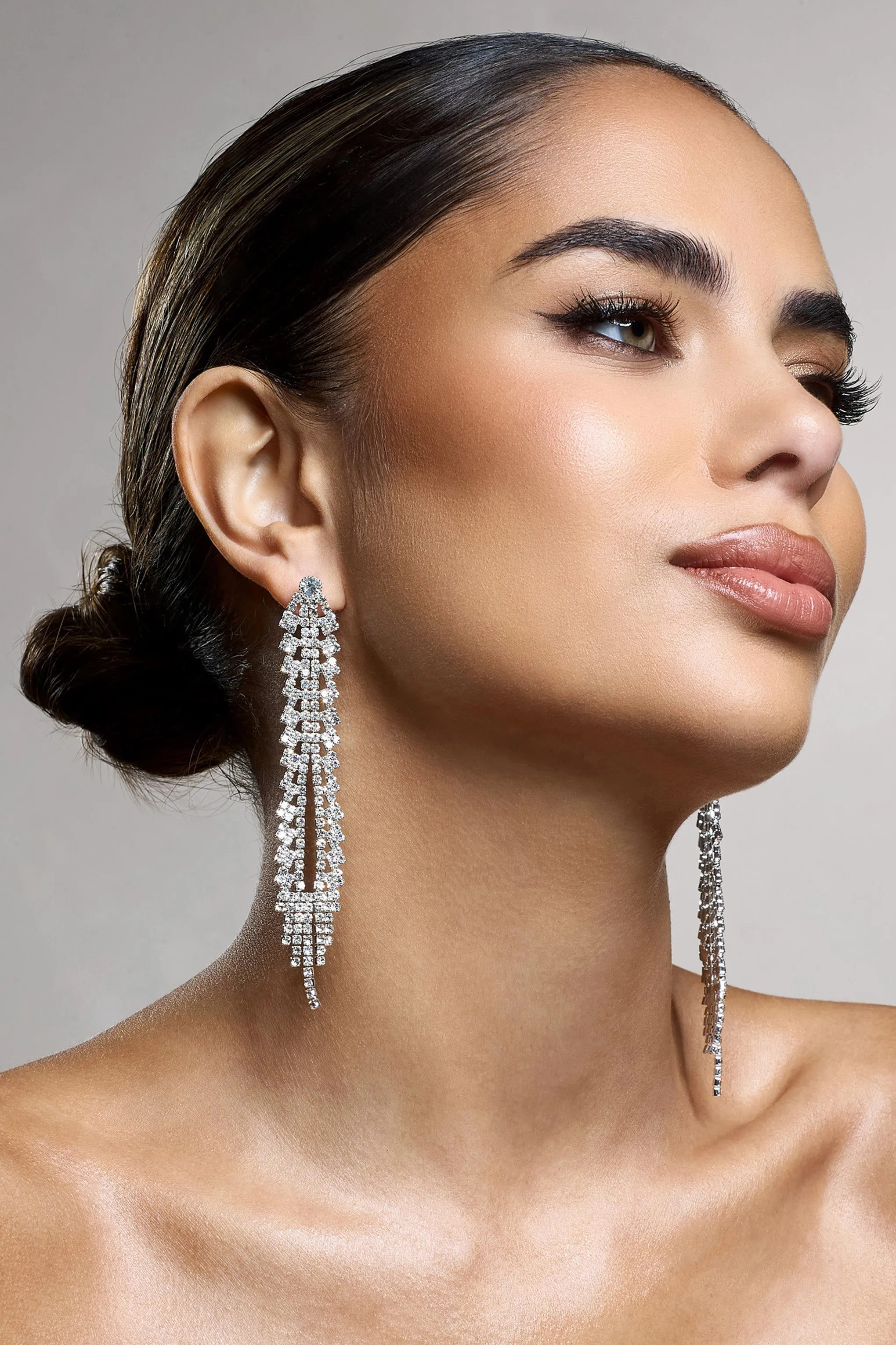 Auria | Silver Diamante Dangle Earrings sold by Club L London