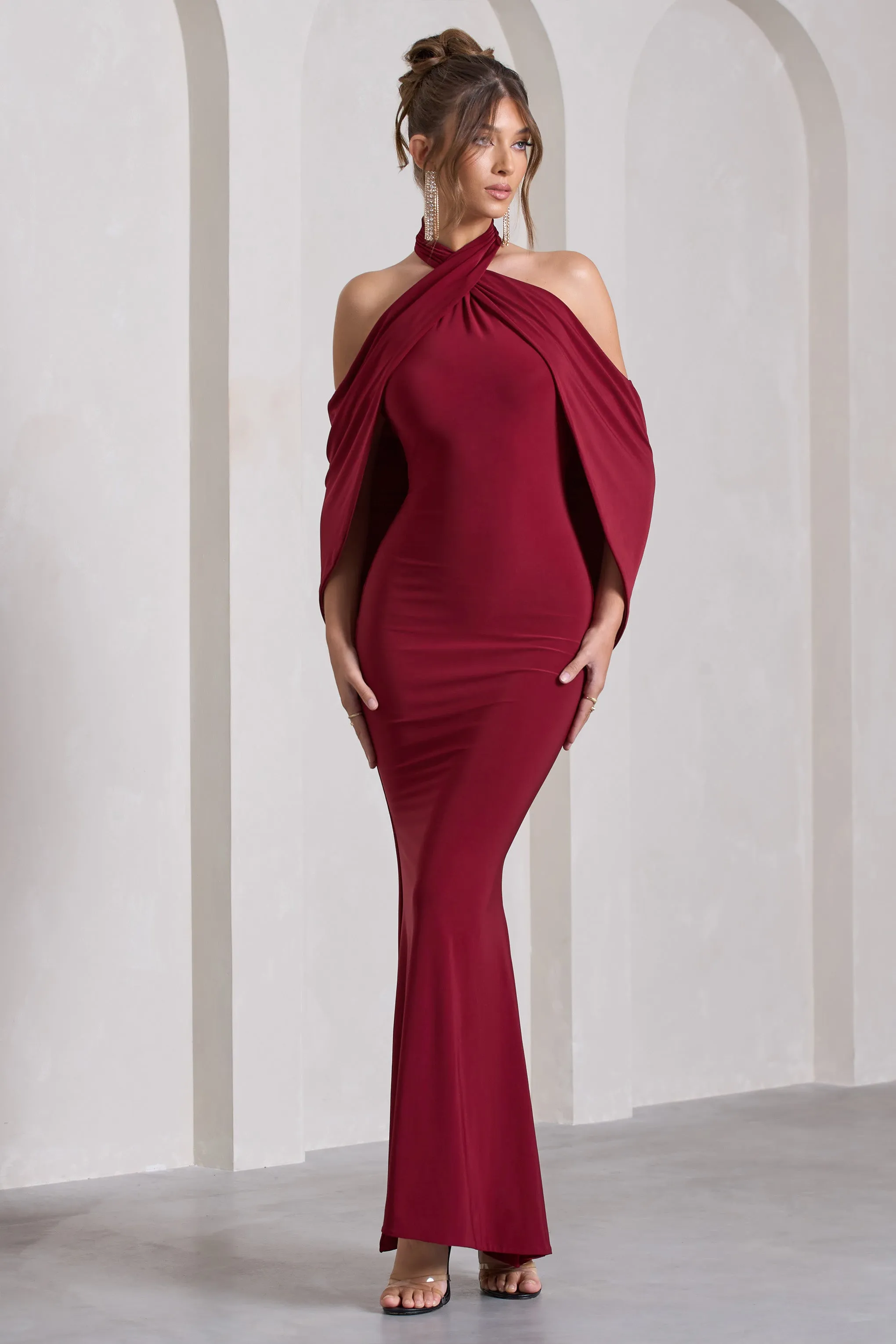Revelation | Berry Red Crossed Halter-Neck Maxi Dress With Cape sold by Club L London