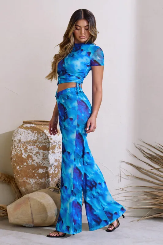 Looking Good | Blue Print High Waist Flared Trousers sold by Club L London