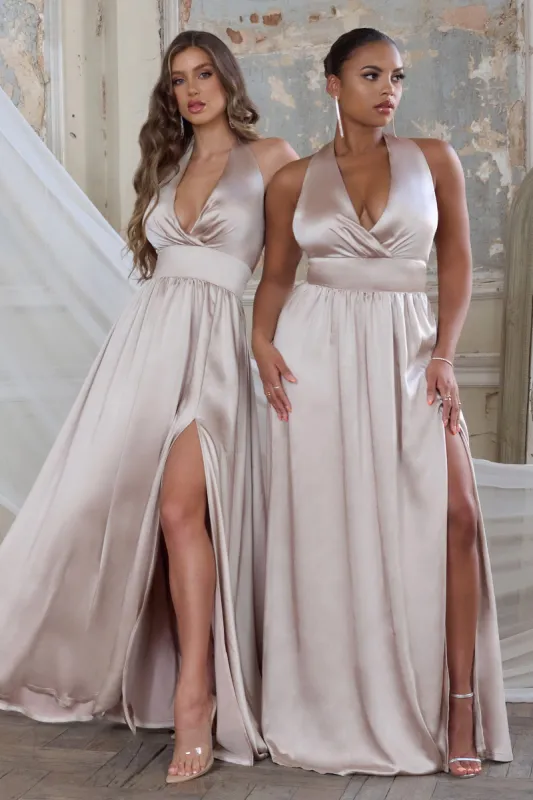Darling | Champagne Satin Halter Neck Bow Back Thigh Split Maxi Dress sold by Club L London