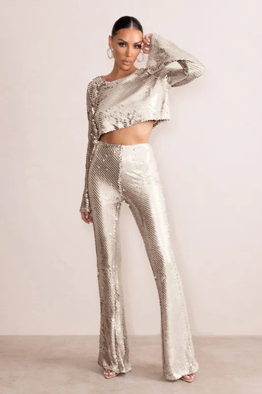 Dropping Hints | Silver Sequin Wide Leg Trousers sold by Club L London