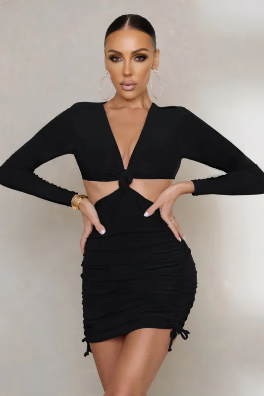 Knot My Problem | Black Long Sleeve Knot Front Ruched Mini Dress sold by Club L London