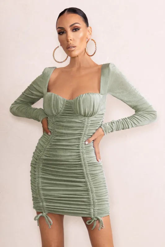 Long Shot | Sage Square Neck Ruched Mini Dress With Long Sleeves sold by Club L London