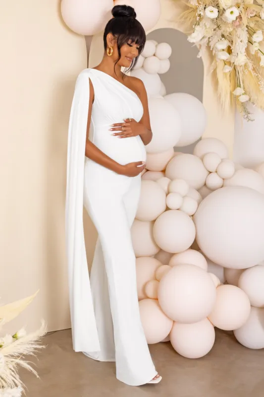 Sing To Sleep | White Maternity One Shoulder Cape Jumpsuit sold by Club L London