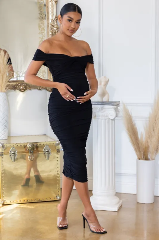 Perfection | Black Maternity Bardot Knot Ruched Midi Dress sold by Club L London