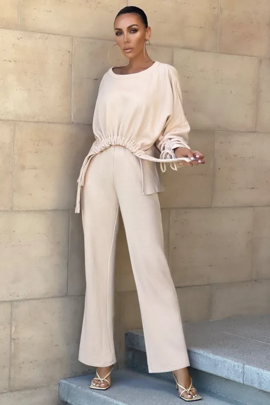 Empower | Cream Relaxed Tie Waist Wide Leg Trousers sold by Club L London