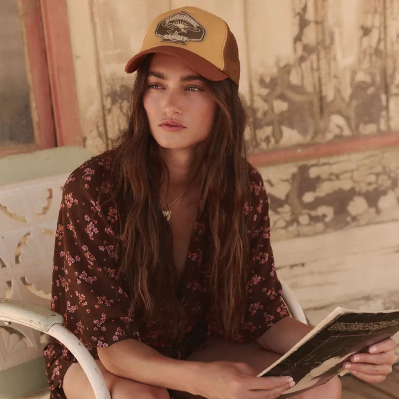 Sunshine Bandit Trucker Hat sold by Spell