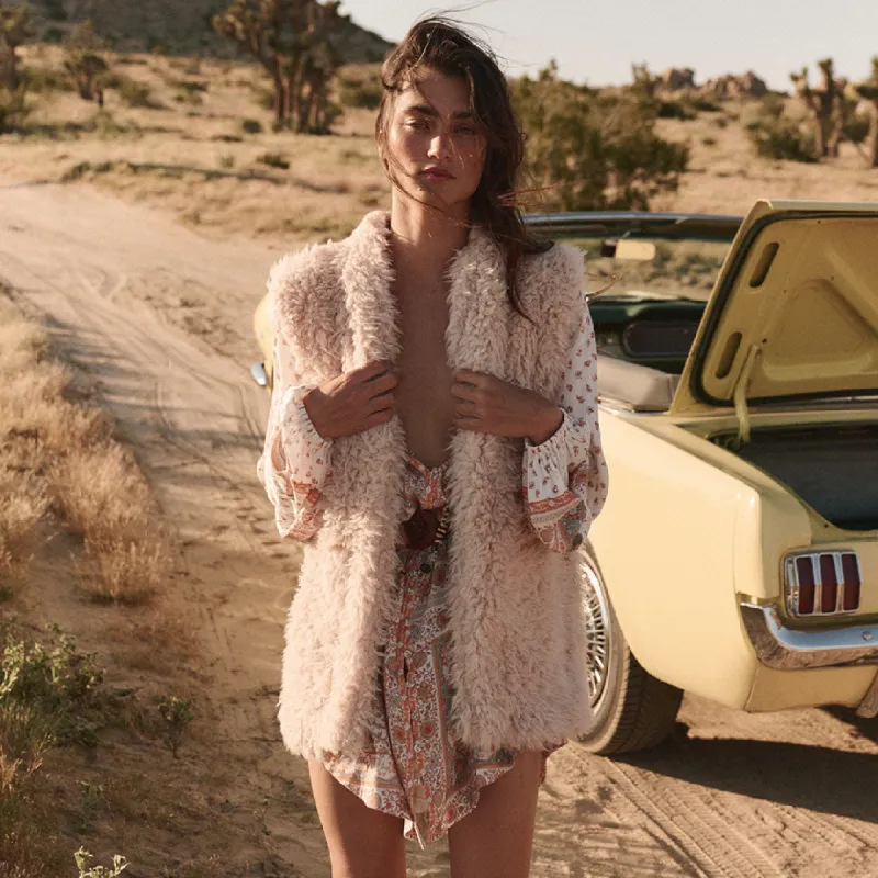 Cloud Nine Vest sold by Spell