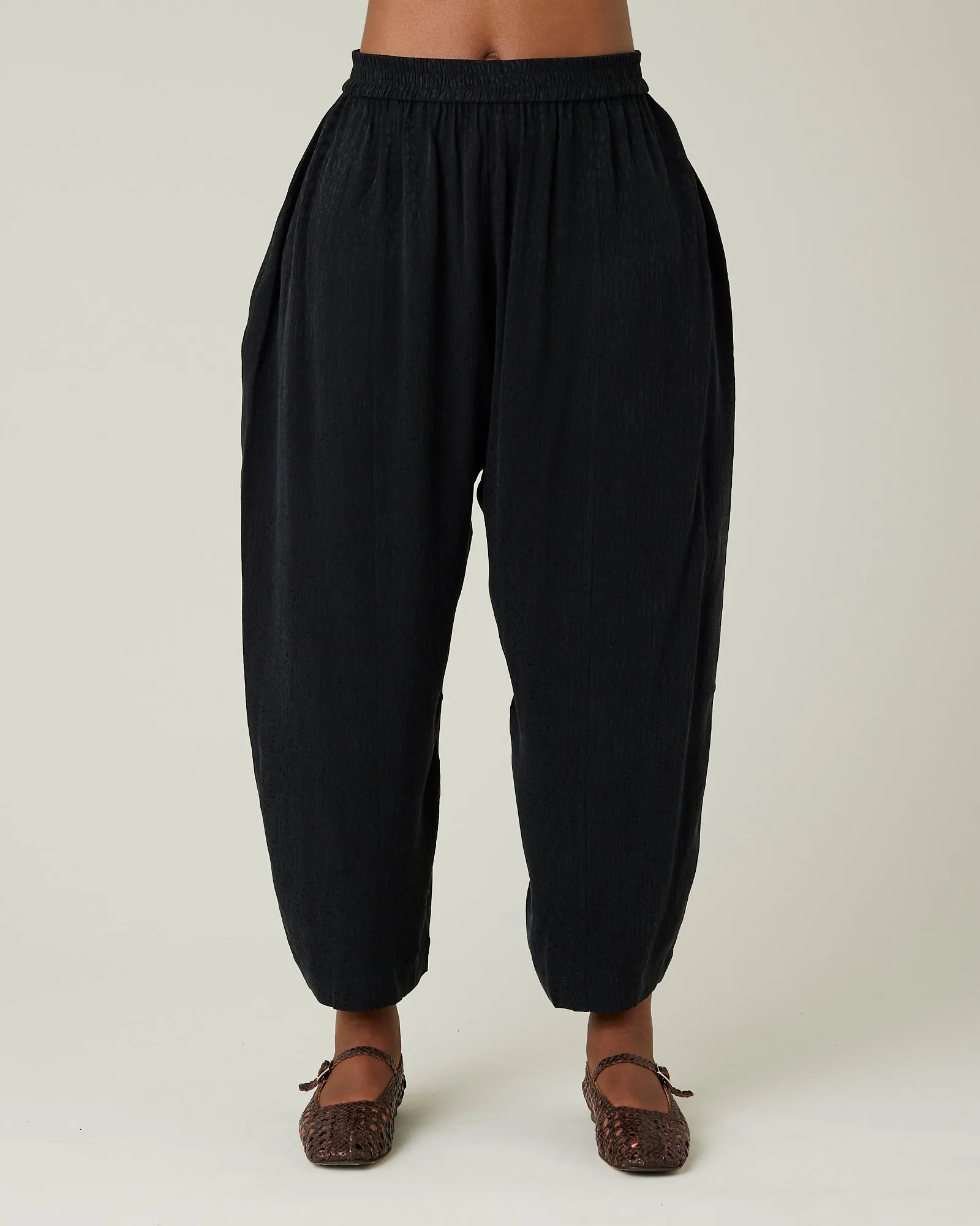 Mabel Black Self Leopard Cupro Trousers sold by Beyond Nine