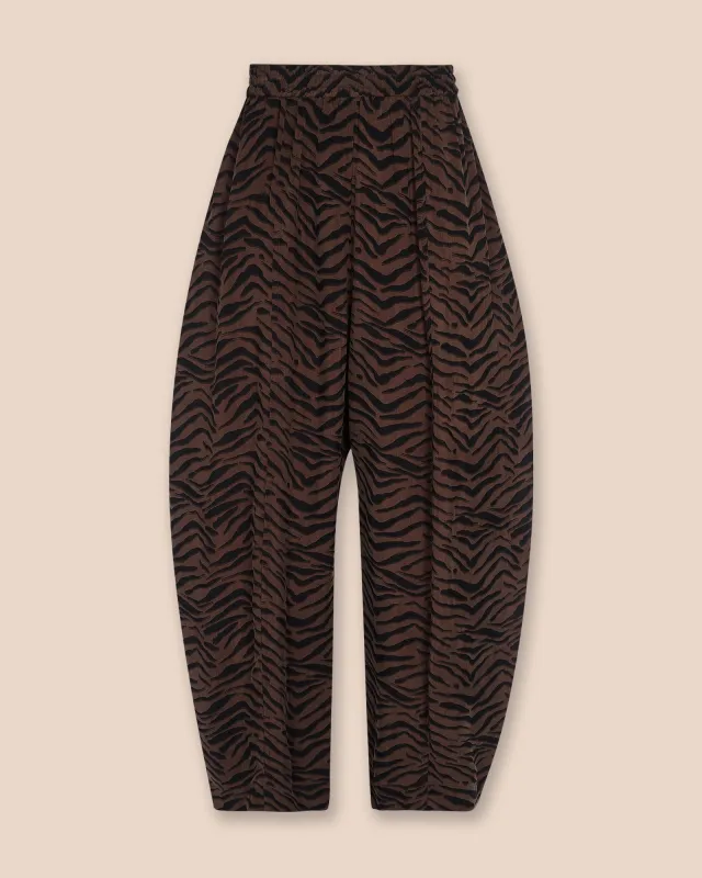 Mabel Tiger Print Cupro Trousers sold by Beyond Nine