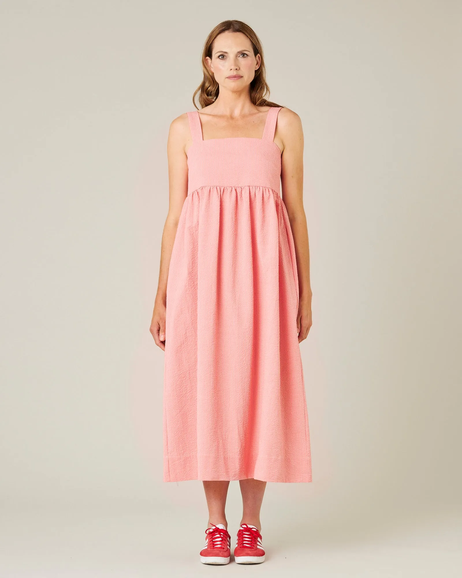 Suki Coral Seersucker Dress sold by Beyond Nine