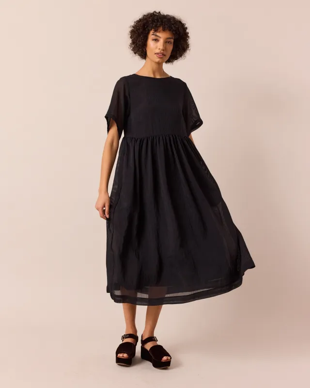 Verona Black Sheer Stripe Dress sold by Beyond Nine