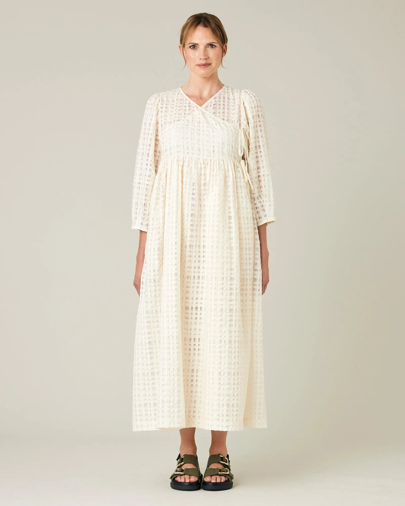 Izzy Ivory Organza Dress sold by Beyond Nine
