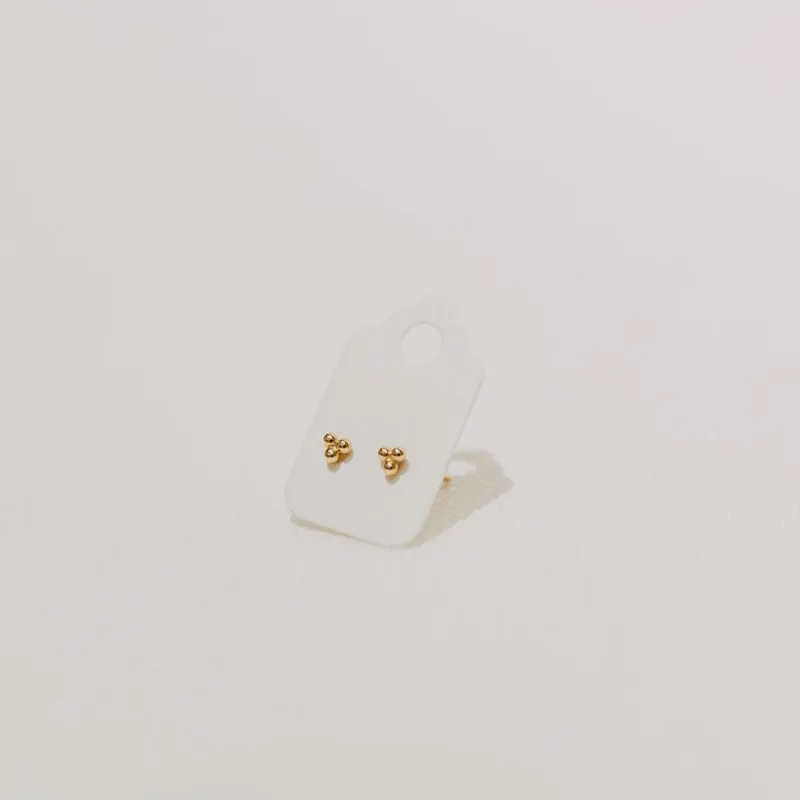 14K Trio Studs sold by Small Mercies