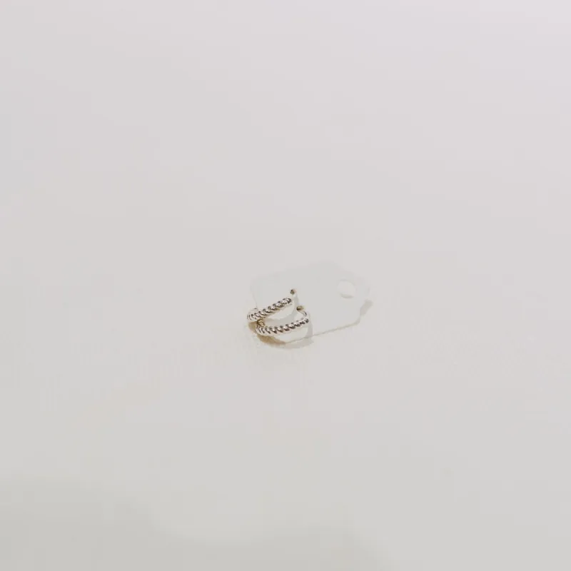 10K Twisted Mini Hoops sold by Small Mercies