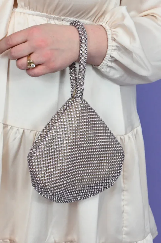 Rhinestone Wrist Pouch sold by Valencia Boutique