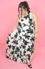 CURVE Floral Pleated Midi Dress sold by Valencia Boutique