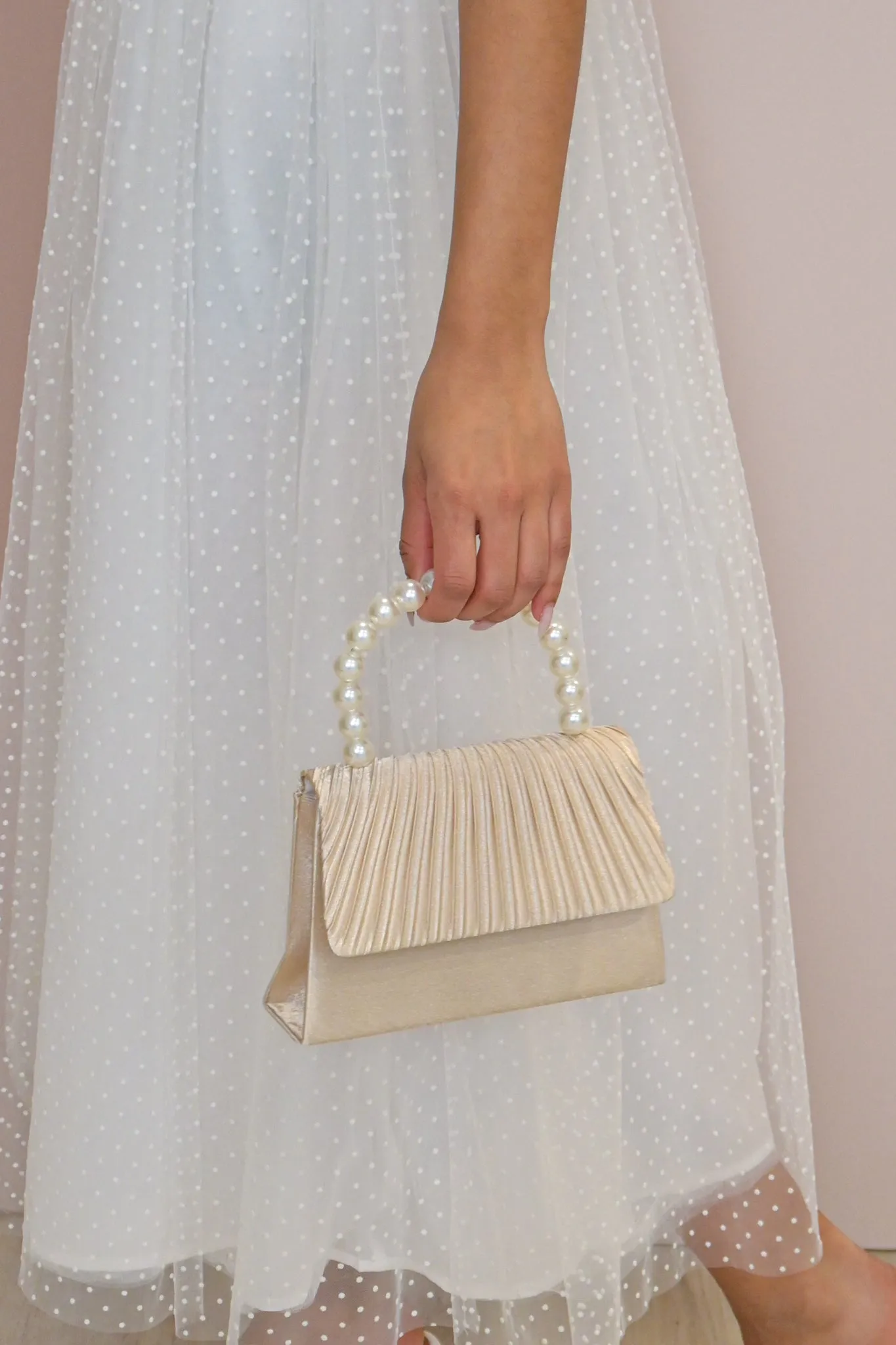 Pleated Pearl Evening Bag sold by Valencia Boutique