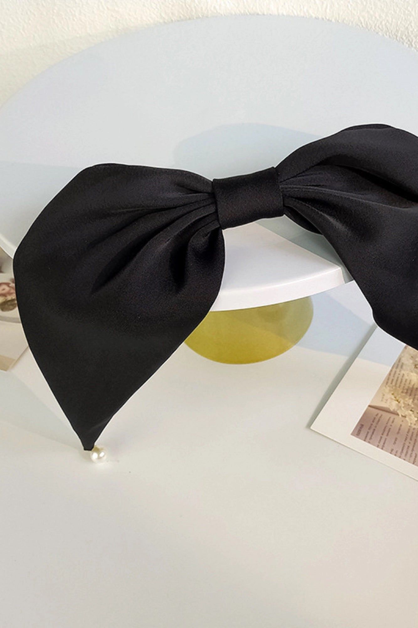 Satin Bow Pearl Clip sold by Valencia Boutique