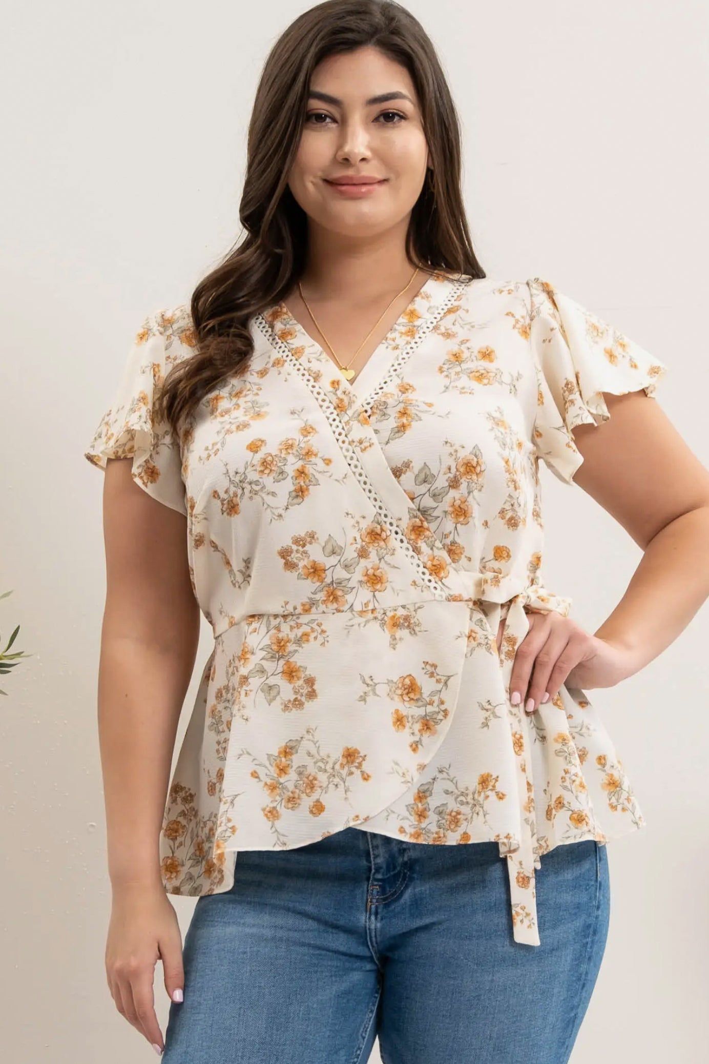 Floral Wrap Blouse (S-3X) sold by Valencia Boutique