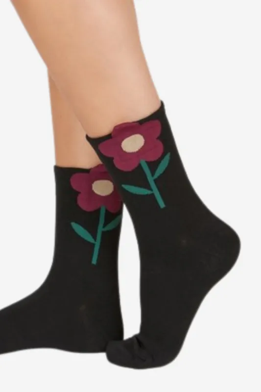 Flower socks sold by Valencia Boutique