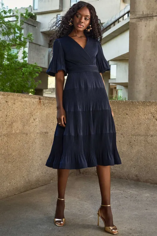 Pleated Woven Fit And Flare Dress sold by Valencia Boutique