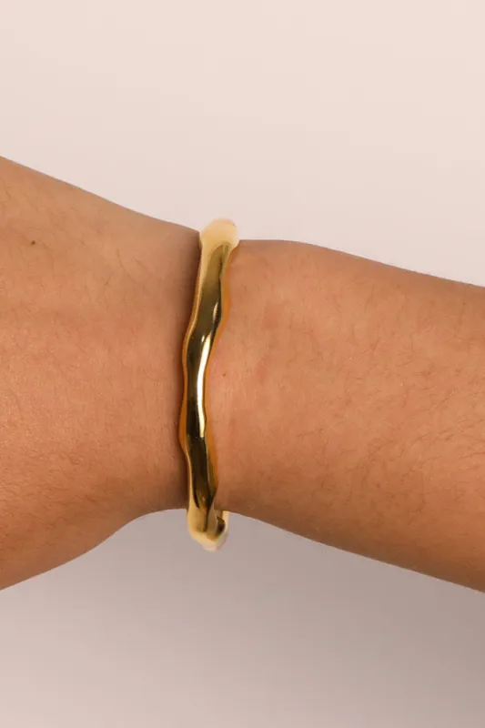 Gold Cuff Bangle sold by Valencia Boutique