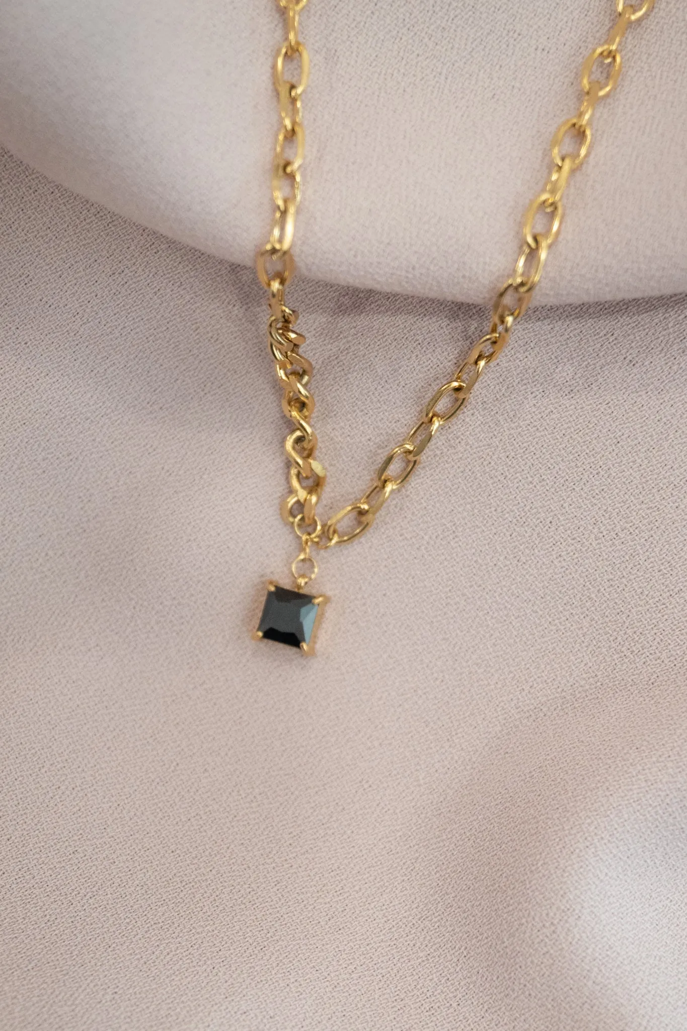 Black Stone Pendant sold by Valencia Boutique