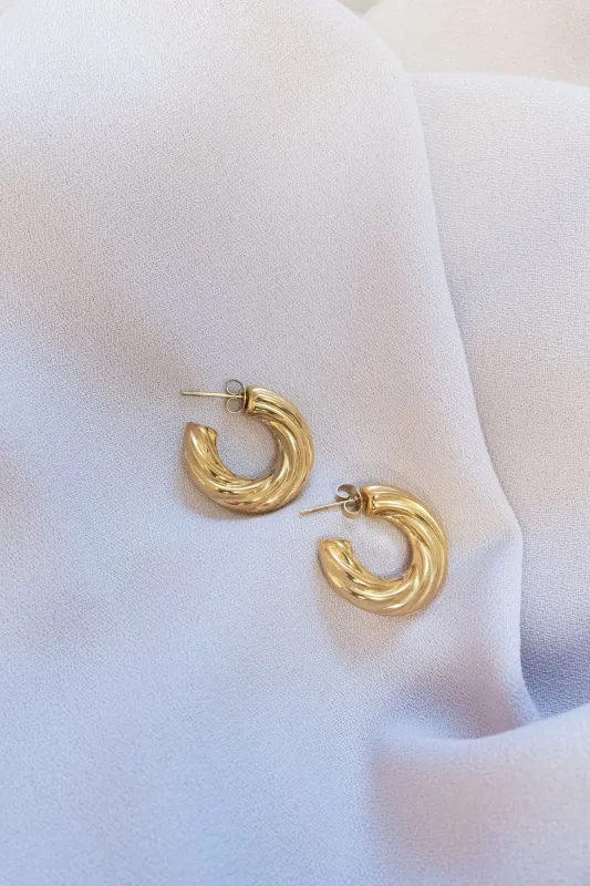 Hollow Twist Hoops made by Valencia Boutique