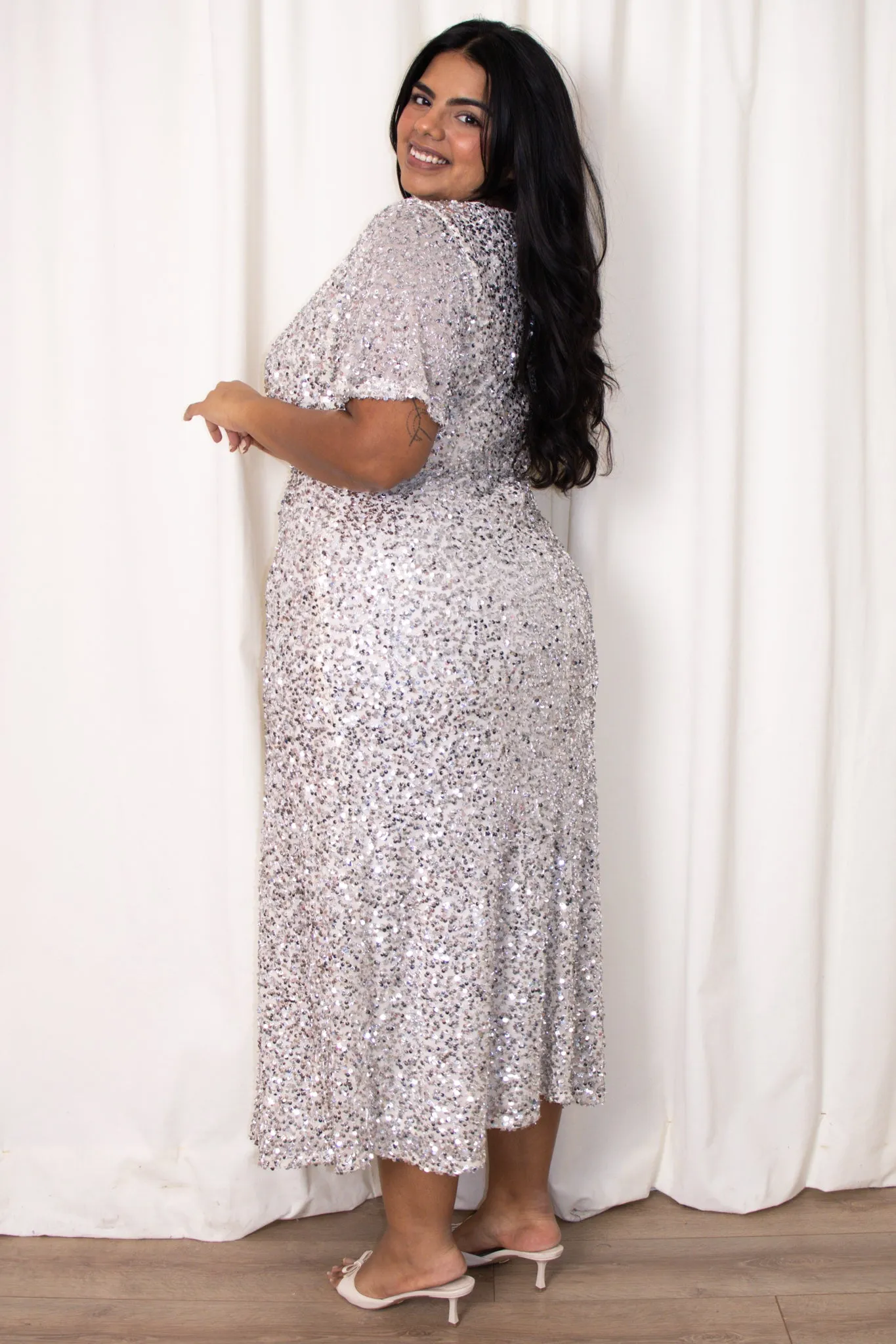 Sequin Flutter Sleeve Midi (2-22) sold by Valencia Boutique product image thumbnail 3