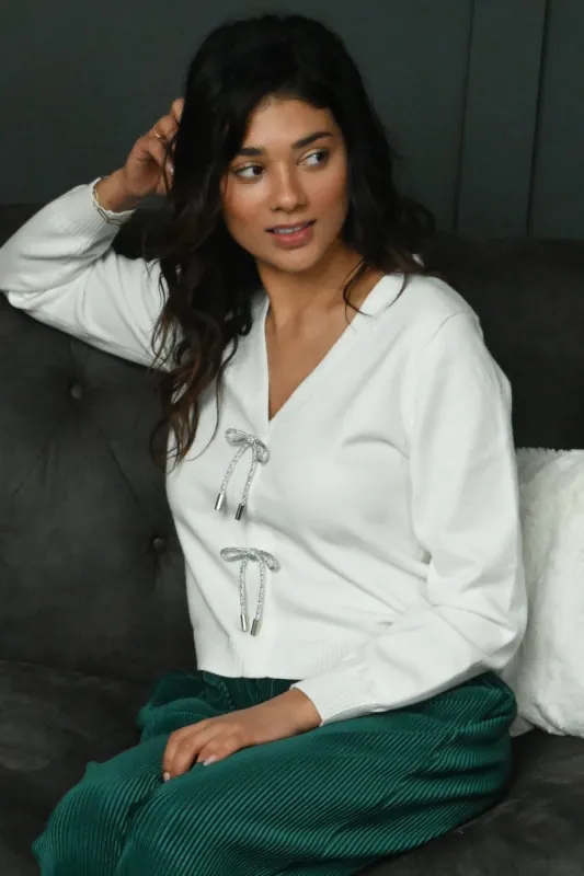 Wrapped In A Bow Sweater sold by Valencia Boutique