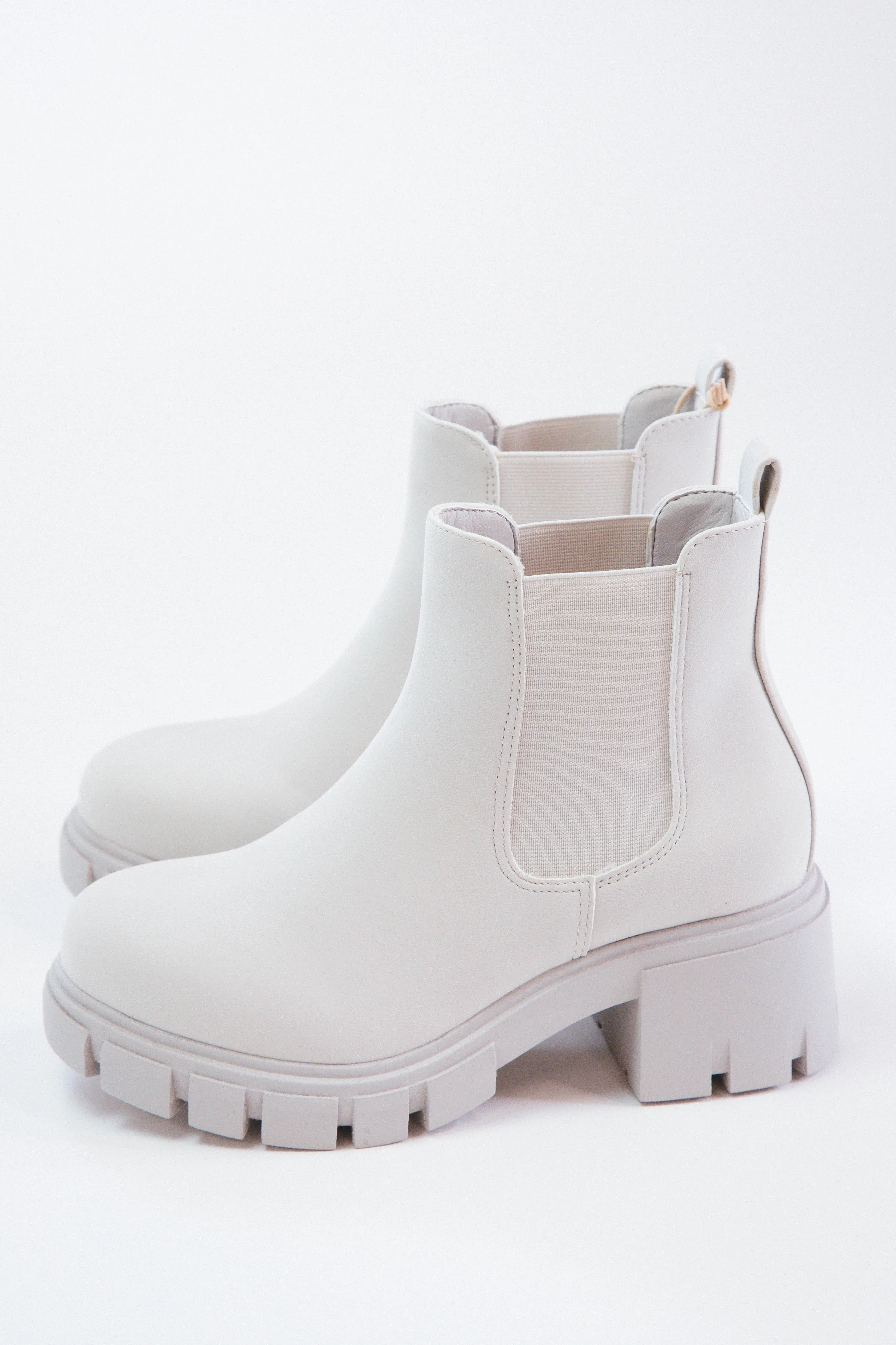 Ivy Pull on Chelsea Lug Sole Bootie, Off White sold by North & Main Clothing Company